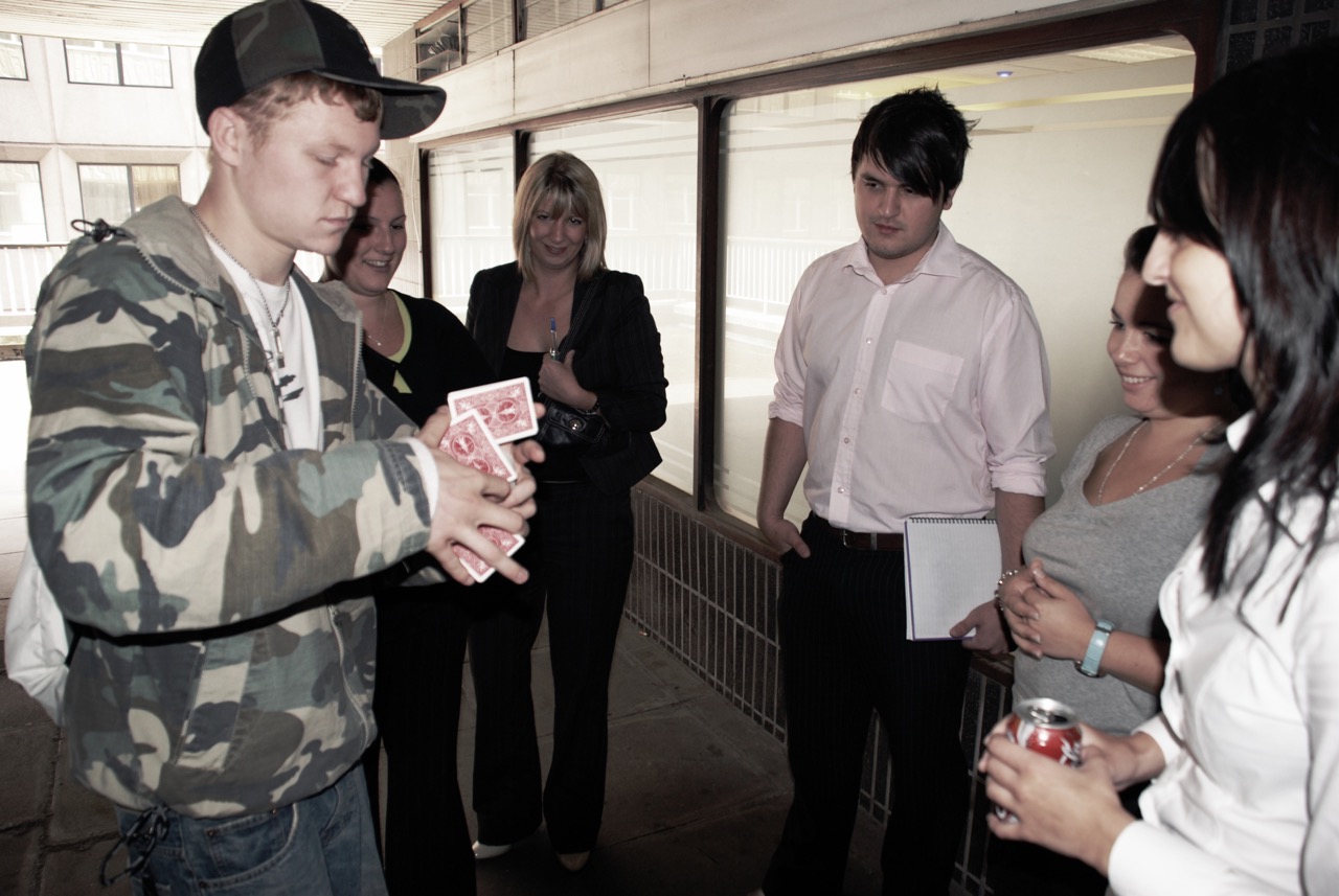 Street Magician Liam Walsh Magic photoshoot of close up magic in London by Kristian Yeomans